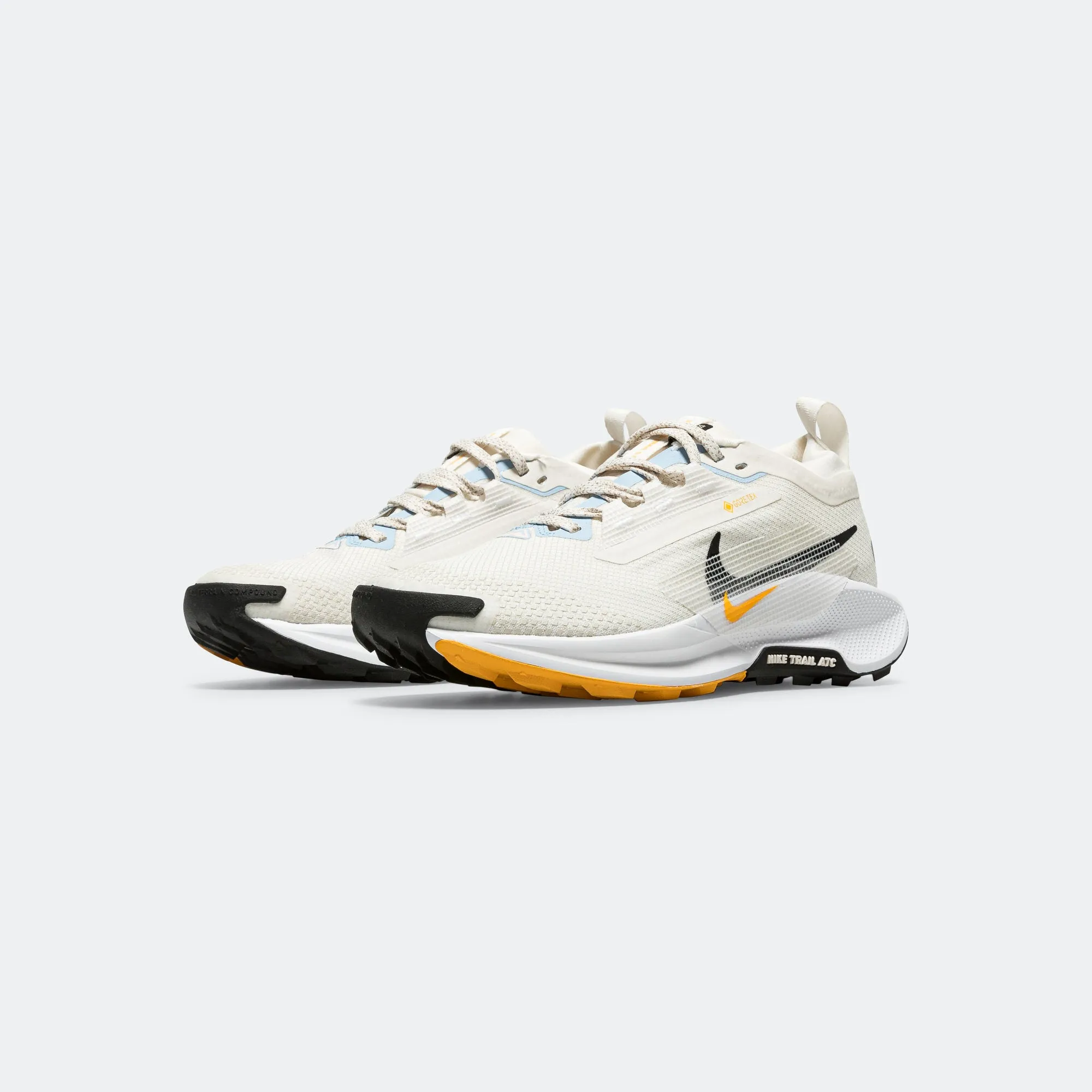 Quiet Traction Comfort Feel Womens ReactX Pegasus Trail 5 GORE-TEX - Phantom White/University Gold-Black