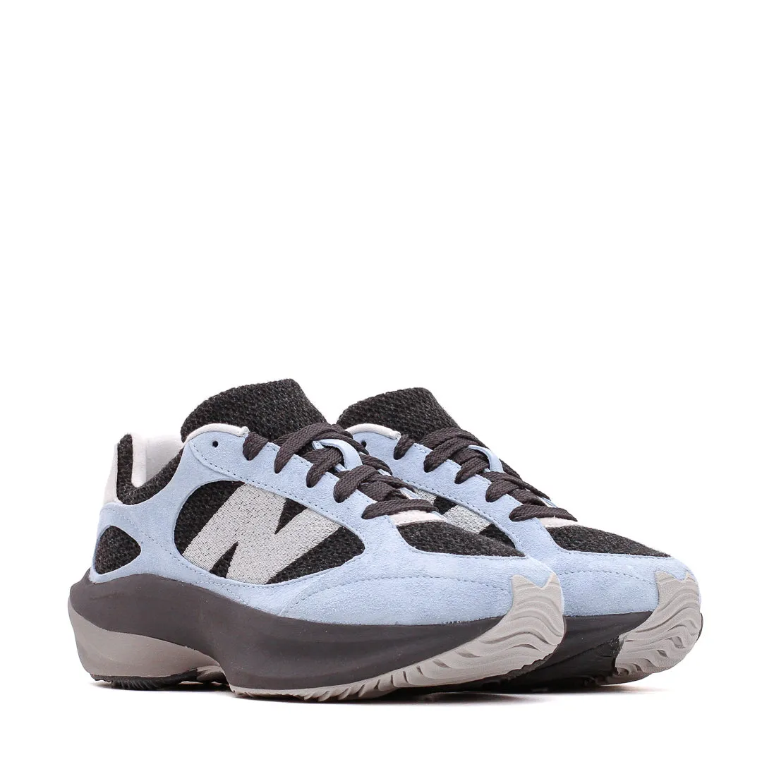 New Balance Unisex WRPD Runner Light Chrome Blue UWRPDFSB running on a dirt track shoes lightweight pants