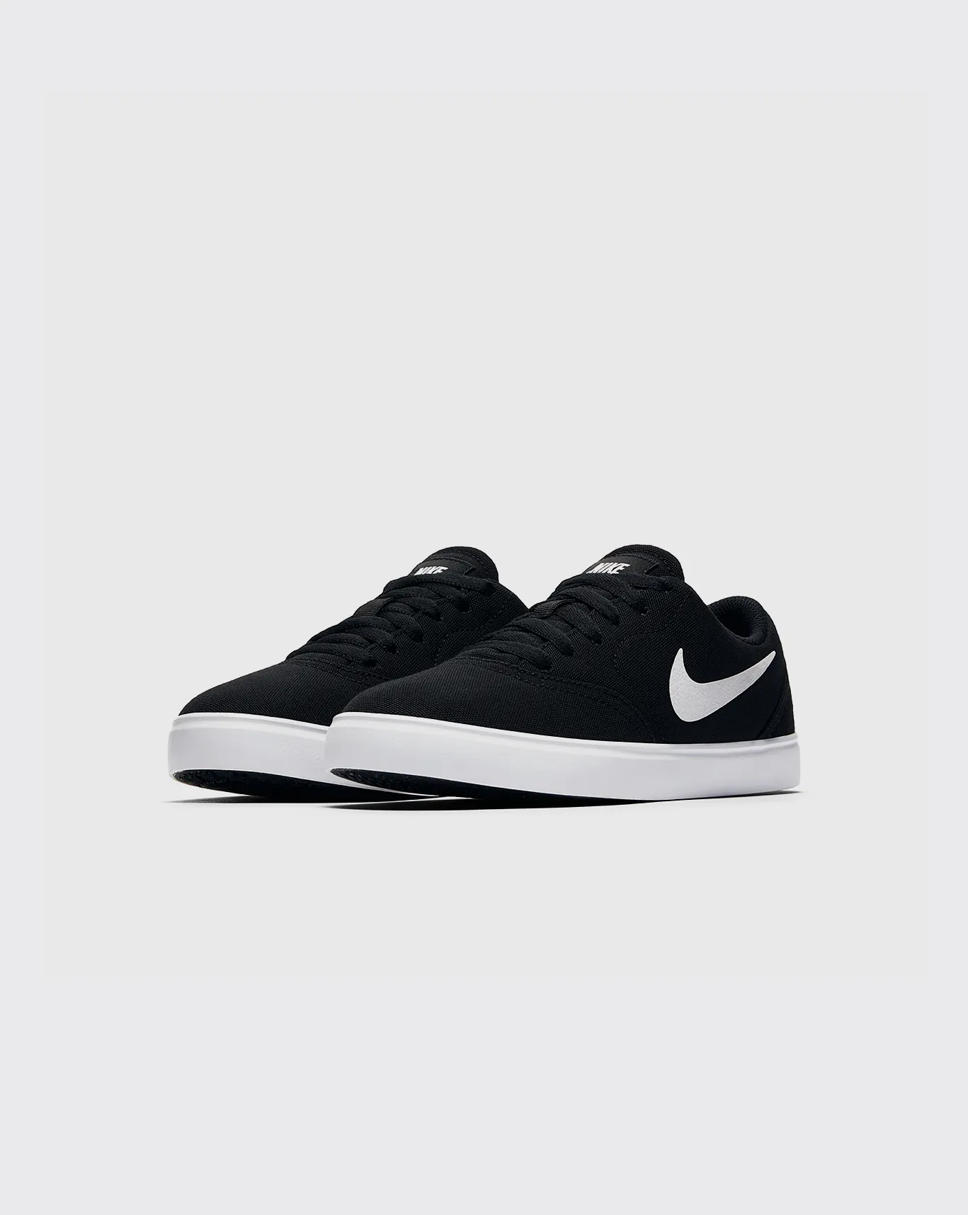 Nike SB Check Canvas Youth Shoe - Black Classic Comfort Everyday Look